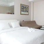 Bright Studio Room At Dago Suites Apartment Near Itb By Travelio